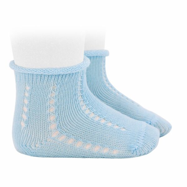 Calzino traforato e polsino risvoltato