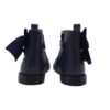 Stivaletto in pelle con fiocco in velluto e zip
