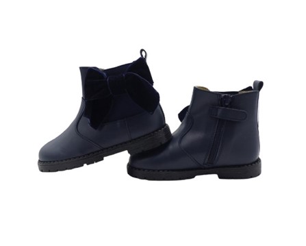 Stivaletto in pelle con fiocco in velluto e zip