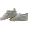 Sneaker in pelle con riporti a contrasto e lacci