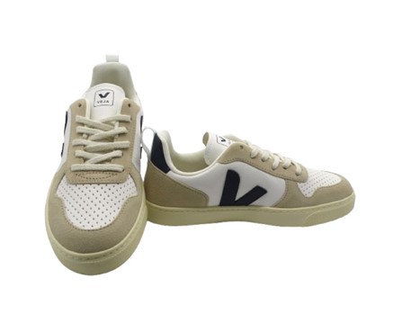 Sneaker in pelle con inserti a contrasto e lacci