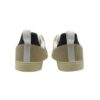 Sneaker in pelle con inserti a contrasto e lacci