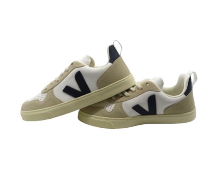 Sneaker in pelle con inserti a contrasto e lacci