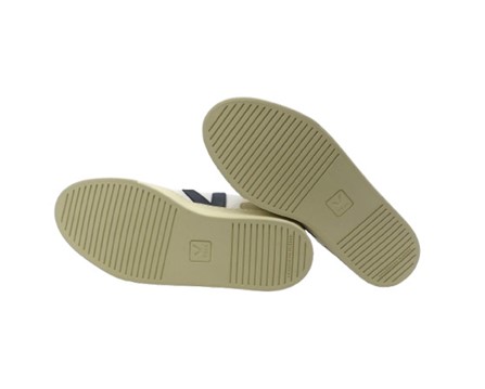 Sneaker in pelle con inserti a contrasto e lacci