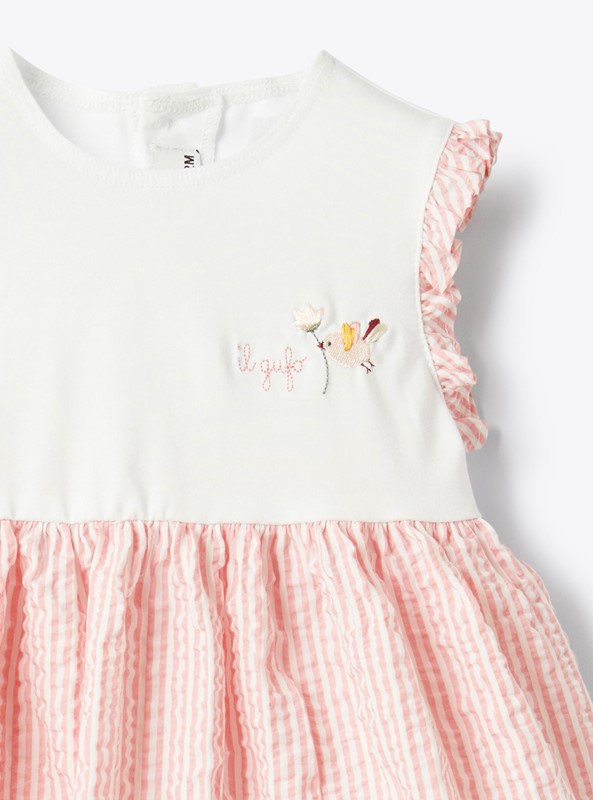 Vestito smanicato con ricamo