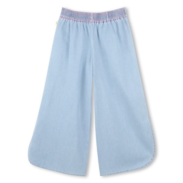 Pantalone denim con ricamo laterale e spacchi
