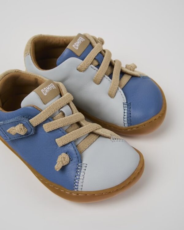 Sneaker in pelle con lacci