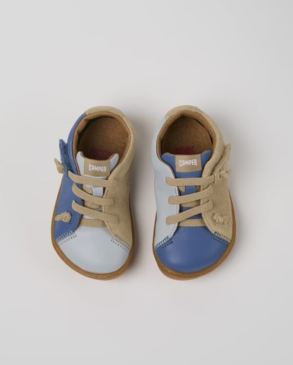 Sneaker in pelle con lacci