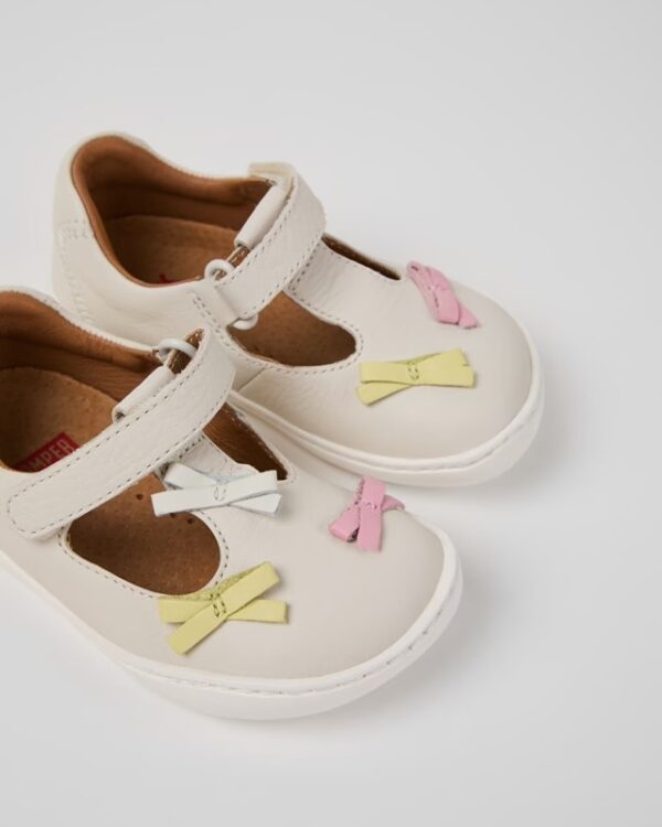 Scarpa due occhi in pelle con fiocchetti e velcro