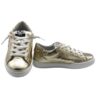 Sneaker bassa in pelle laminata con lacci