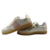 Sneaker in pelle e camoscio con lacci e zip
