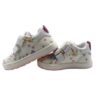Sneaker in tela fantasia fiori e pelle con doppio velcro