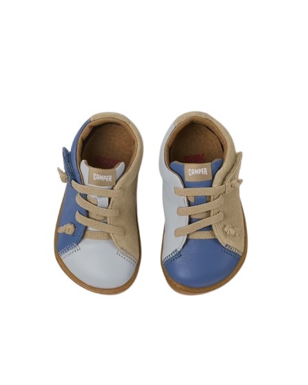 Sneaker in pelle con lacci