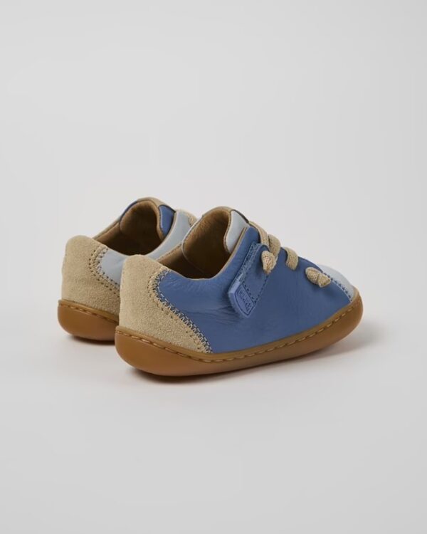 Sneaker in pelle con lacci
