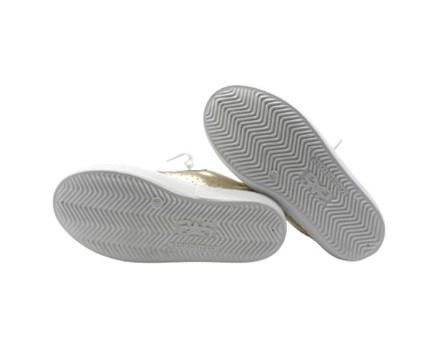 Sneaker bassa in pelle laminata con lacci