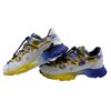 Sneaker in ecopelle e tessuto tecnico con lacci a coulisse