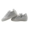 Sneaker in pelle con lacci e zip
