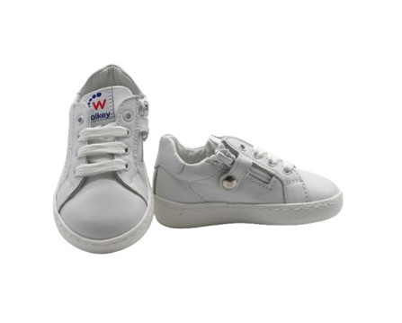Sneaker in pelle con lacci e zip