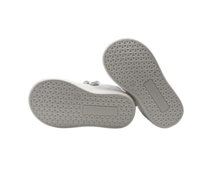 Sneaker in pelle con lacci e zip