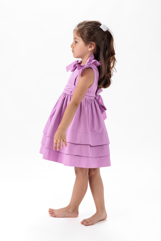 Vestito con fiocchi sulle spalle