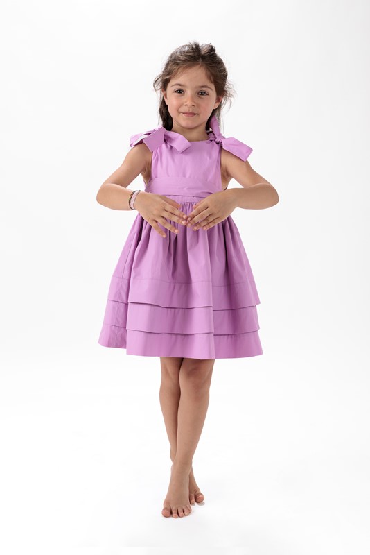 Vestito con fiocchi sulle spalle