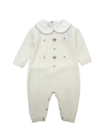 Tutina con fiocchi e pois ricamati