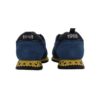 Sneaker bassa in camoscio e tessuto con velcro e lacci