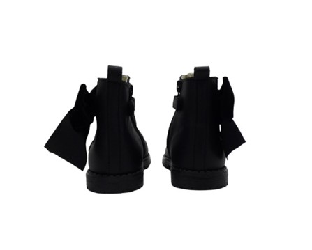 Stivaletto in pelle con fiocco in velluto laterale e zip