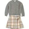 Completo maglione con trecce e pantagonna quadri