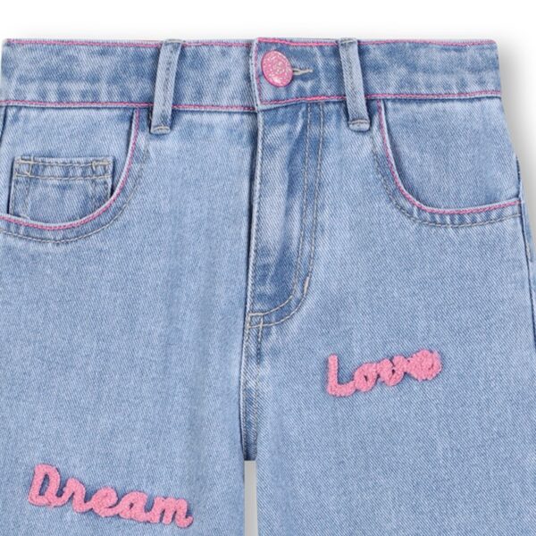 Pantalone in denim con scritte effetto spugna
