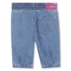 Pantalone in denim leggero con borchie laterali