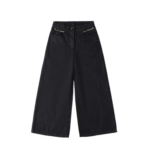 Pantalone denim gamba ampia con catena alle tasche