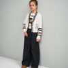 Pantalone denim gamba ampia con catena alle tasche
