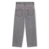Pantalone in denim con borchie a stella laterali