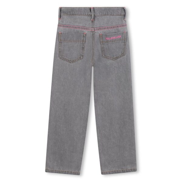Pantalone in denim con borchie a stella laterali