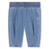 Pantalone in denim leggero con borchie laterali