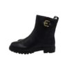 Stivaletto in pelle con fibbia laterale e zip