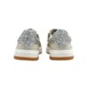 Sneaker in pelle e glitter con lacci e zip