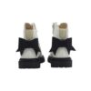 Stivaletto in pelle con fiocco posteriore e zip