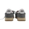 Sneaker in camoscio e glitter con lacci
