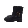 Stivaletto in pelle con fibbia laterale e zip