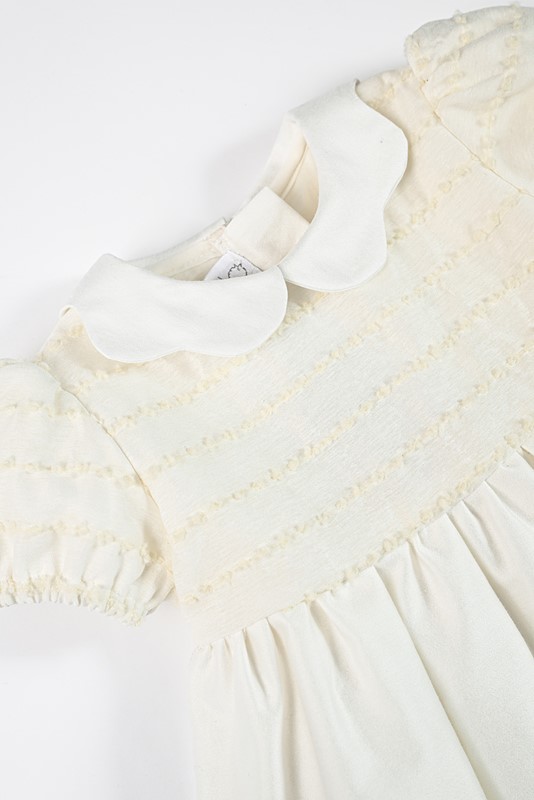 Vestito in velluto e plumets