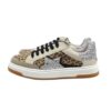 Sneaker in pelle e glitter con lacci e zip