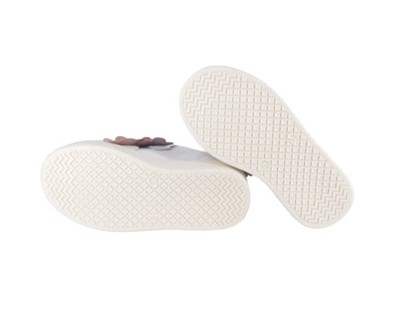 Sneaker in pelle con doppio velcro e fiori