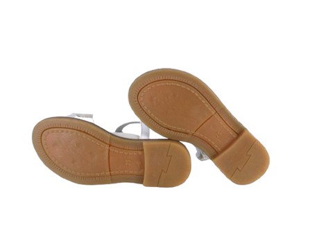 Sandalo in pelle con fiocco e cinturino alla caviglia