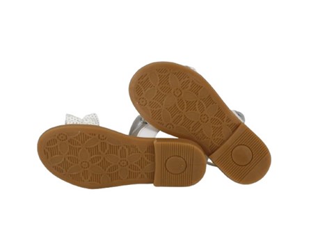 Sandalo in pelle con fascia volant a pois traforati e velcro