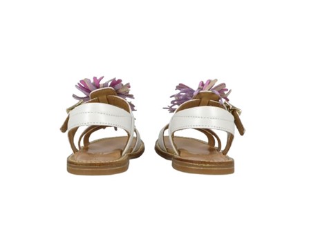 Sandalo in pelle con pom pon e fibbia