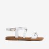 Sandalo in pelle con borchie e fibbia