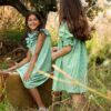 Vestito vichy con fiocchi
