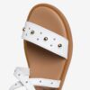 Sandalo in pelle con borchie e fibbia